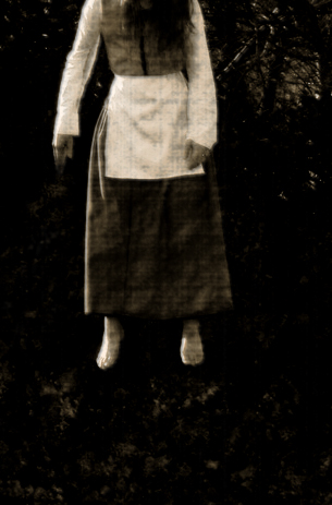 A dark, eerie image of a woman in period dress and apron hovering with her feet off the ground